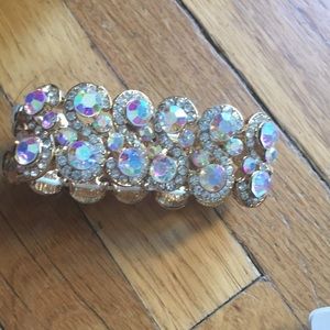 a fake diamond and gold bracelet